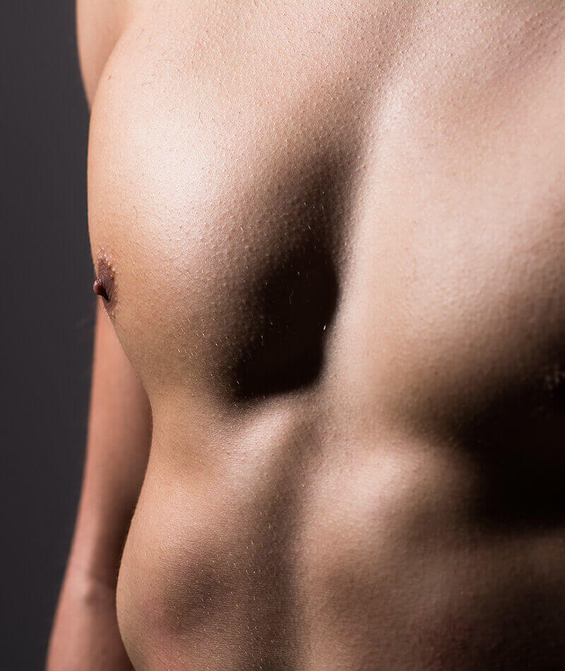 Close up of fit man's chest