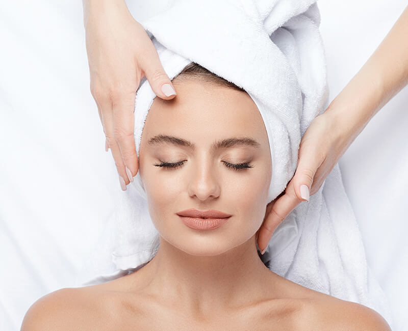 Woman getting a facial massage