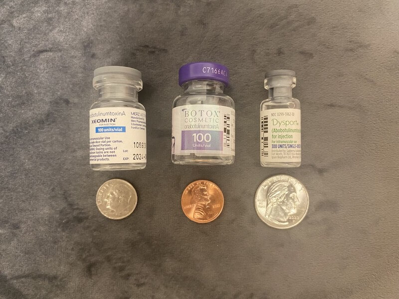 Size of toxin injections next to coins